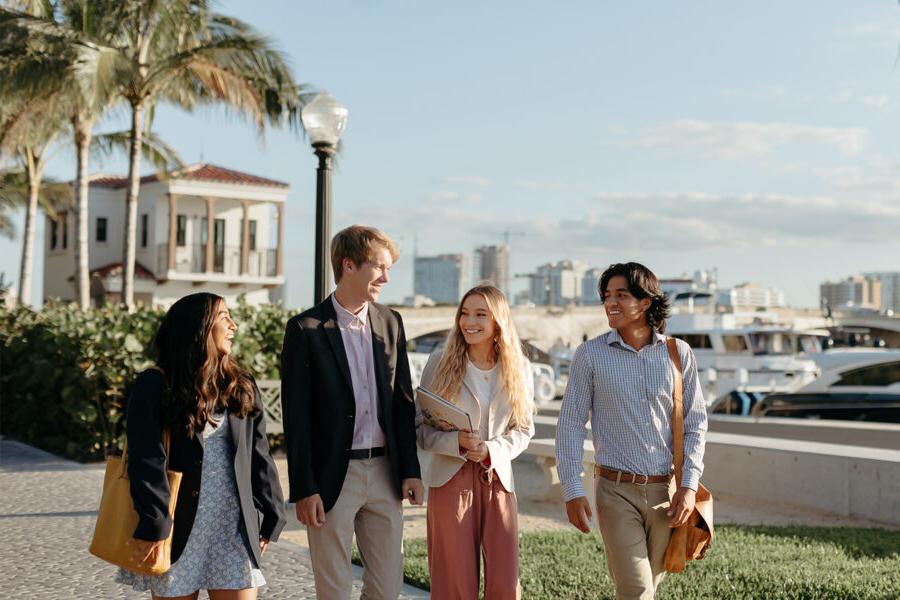 master of business administration mba students walk near the intercoastal waterway in 西<a href='http://1m4.hf-dc.net'>推荐全球最大网赌正规平台欢迎您</a>.